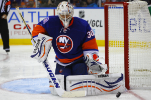 NY Islanders Goaltender Chad Johnson makes a pad save.(Brandon Titus/Inside Hockey)