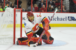 10 Nov 2014 Calgary Flames Goalie Jonas Hiller (1) [6070] makes a save during the first period of the game between the Calgary Flames and the Carolina Hurricanes at the PNC Arena in Raleigh, NC. Carolina defeated Calgary 4-1.