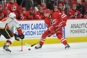 10 Nov 2014 Carolina Hurricanes Right Wing Elias Lindholm (16) [10261] skates with the puck during the third period of the game between the Calgary Flames and the Carolina Hurricanes at the PNC Arena in Raleigh, NC. Carolina defeated Calgary 4-1.