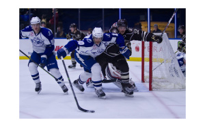 Mike Angelidis gets the puck in front of the net against the Hershey Bears ©KevinBurns