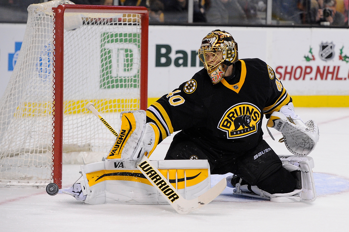 Dec 13, 2014; Boston Bruins goalie Tuukka Rask (40) blocks a shot during an NHL game in the TD Garden in Boston. (Photo: Brian Fluharty)