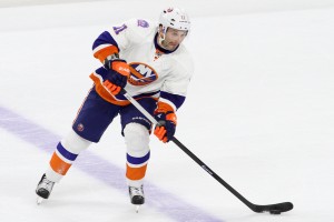 Defenseman Lubomir Visnovsky (#11) of the New York Islanders looks to pass the puck