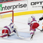 NHL 2015 - Sept 22 - NYR vs PHI - Center Sam Gagner (#89) of the Philadelphia Flyers scores a goal against Goalie Antti Raanta (#32) of the New York Rangers