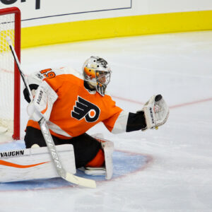 Goalie Alex Lyon (#49) of the Philadelphia Flyers makes a glove save
