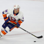 Defenseman Mitchell Vande Sompel (#58) of the New York Islanders turns with the puck