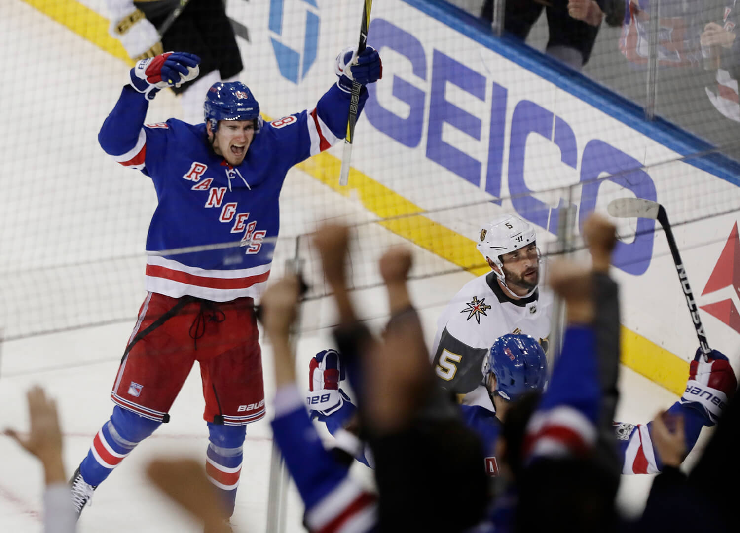 On a dark day, Rangers lift a city with win
